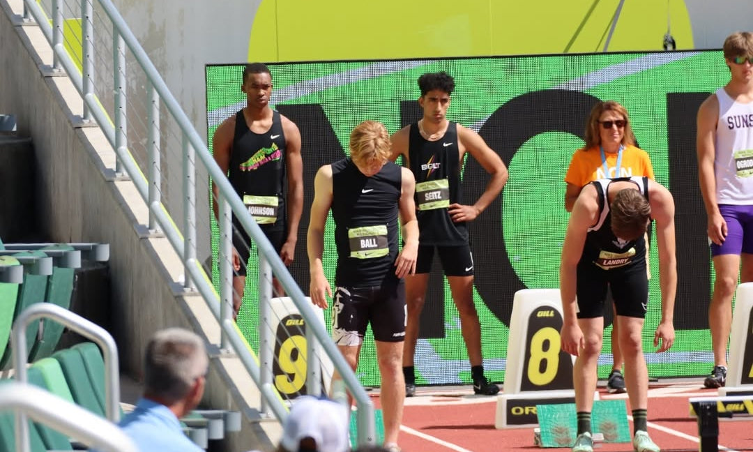 Runners on the start line at a track meet