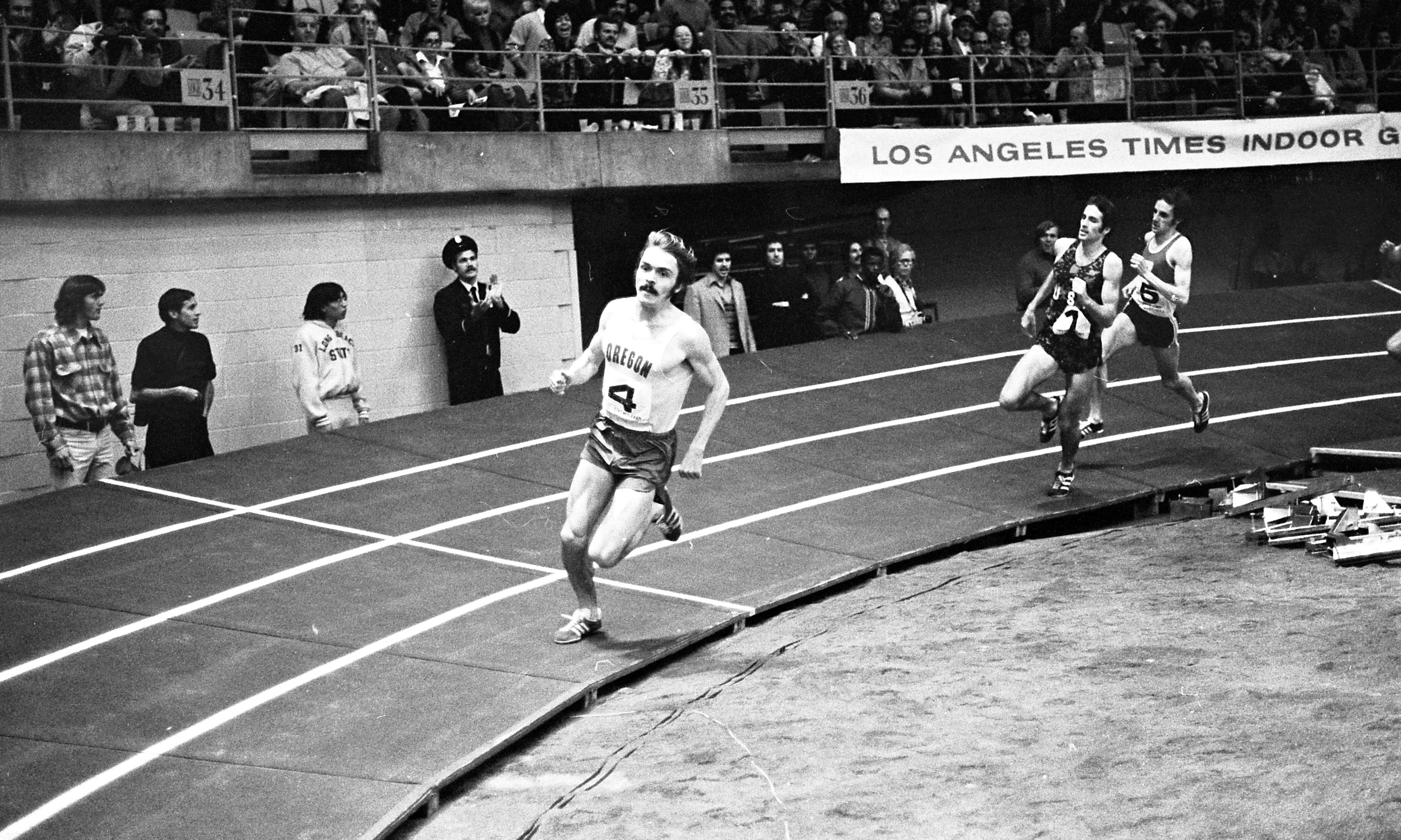 Steve Prefontaine leading Marty Liquori and Gianni Del Buono at the 1973 Los Angeles Times Indoor Games